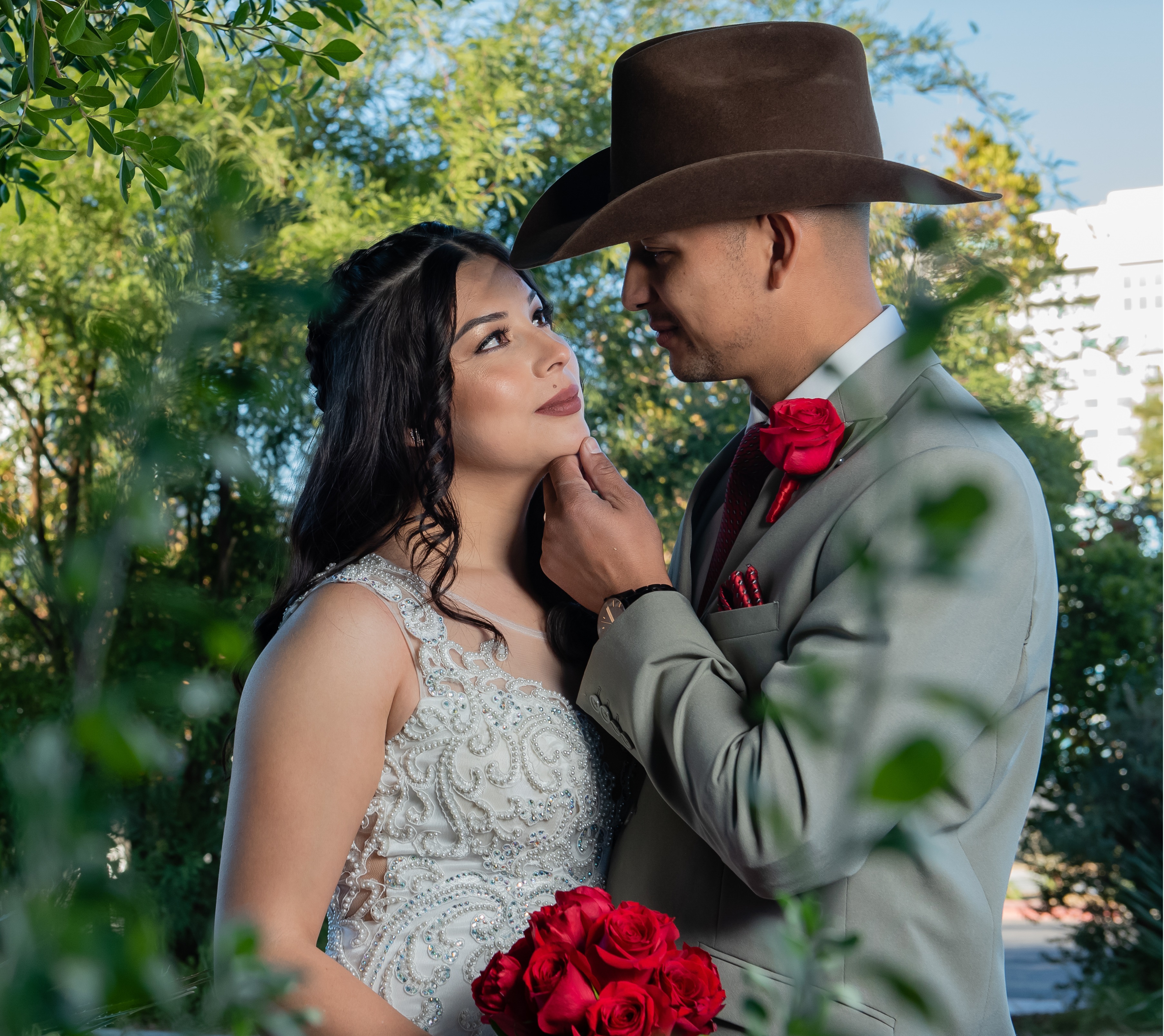 Couple smiling at each other at their luxurious wedding day